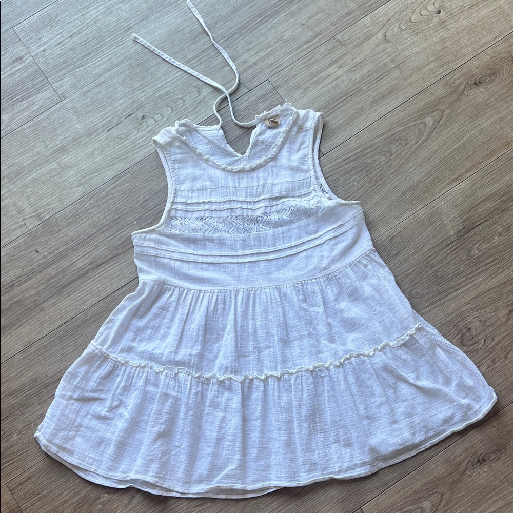 White Sleeveless Tiered baby doll style shirt